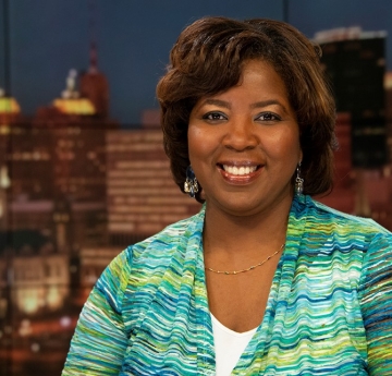 Newsanchor Claudine Ewing