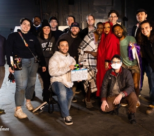 Group of students with clap board